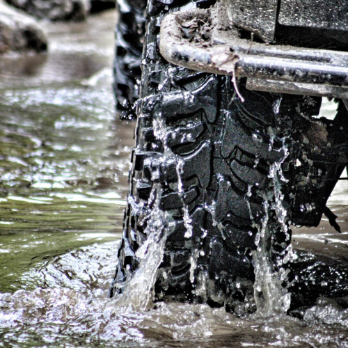 Accelera Badak X-treme mud tire in a stream