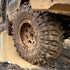Accelera Badak X-Treme - extreme mud terrain tire in a puddle