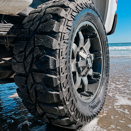 Tire Streets Armstrong Desert Dog Mud Terrain Off Road Tire  Close Up at Beach